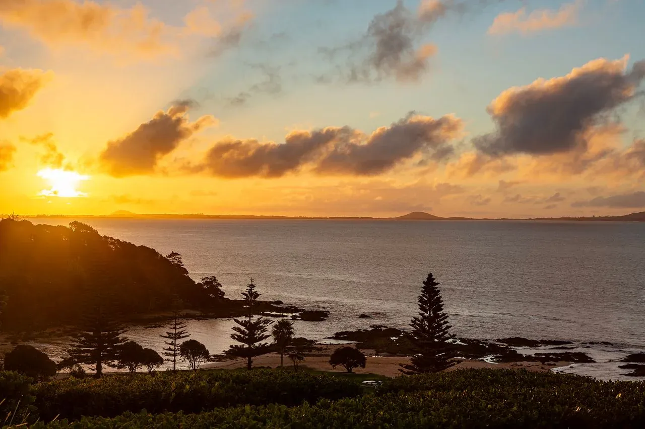 Crystal-clear waters and rocky shores of Cable Bay, a hidden gem for snorkeling and relaxation.