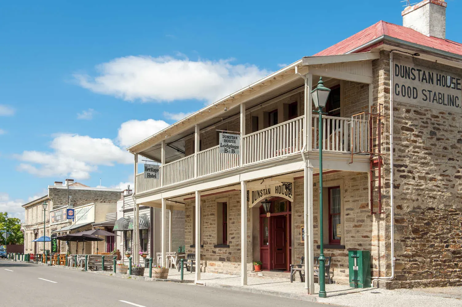 Historic Clyde main street, featuring Dunstan House and heritage-rich hospitality businesses.