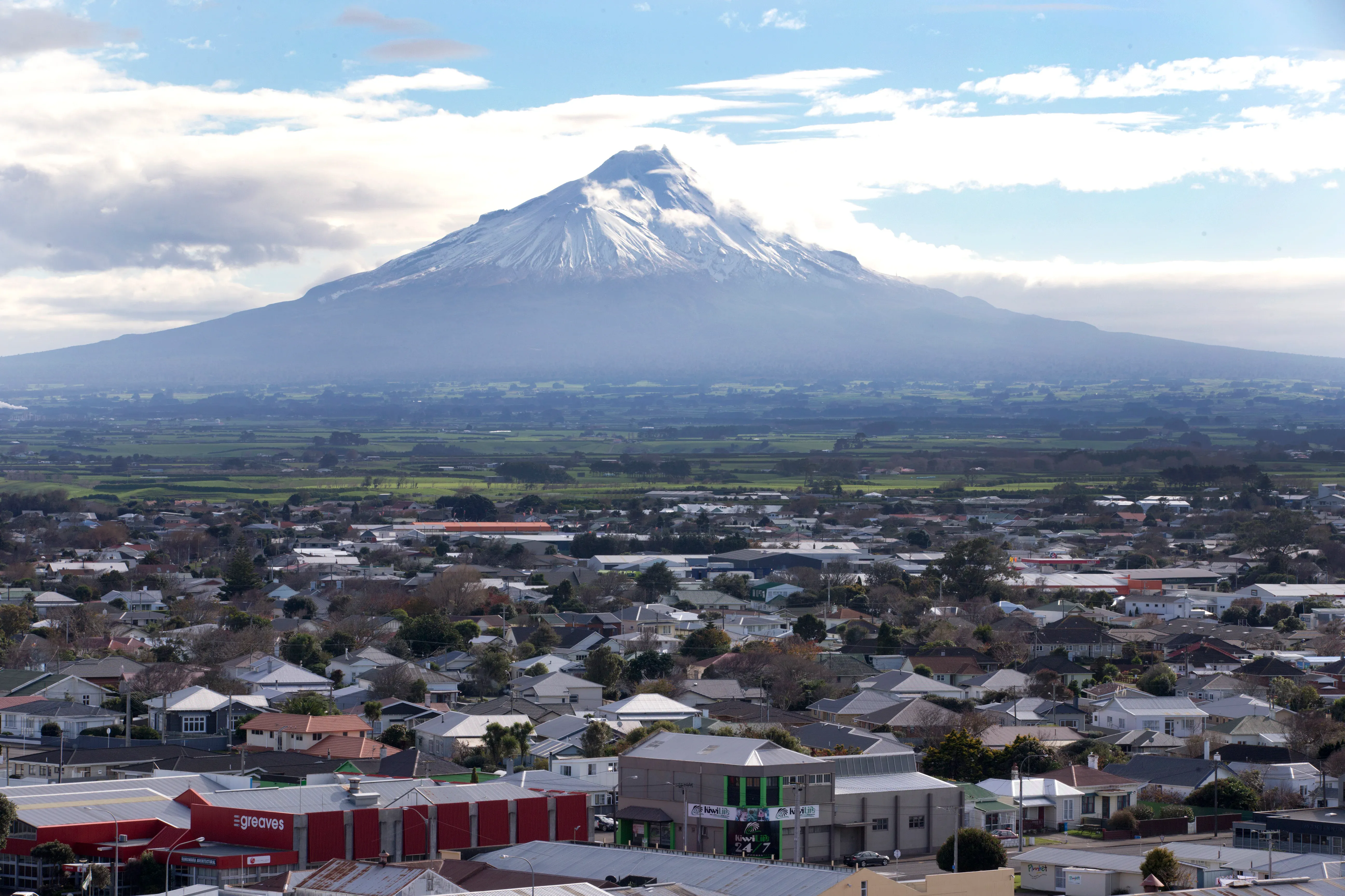 Hāwera township with Mount Taranaki in the background, directory of businesses in South Taranaki.