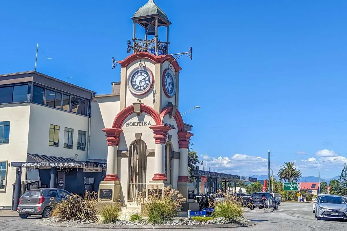 Hokitika clock tower and surrounding businesses, West Coast NZ directory for local services.