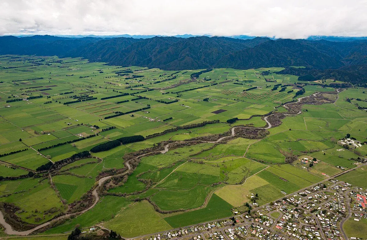 Aerial view of Murupara's farmland and river, ideal for agribusiness and outdoor activities.